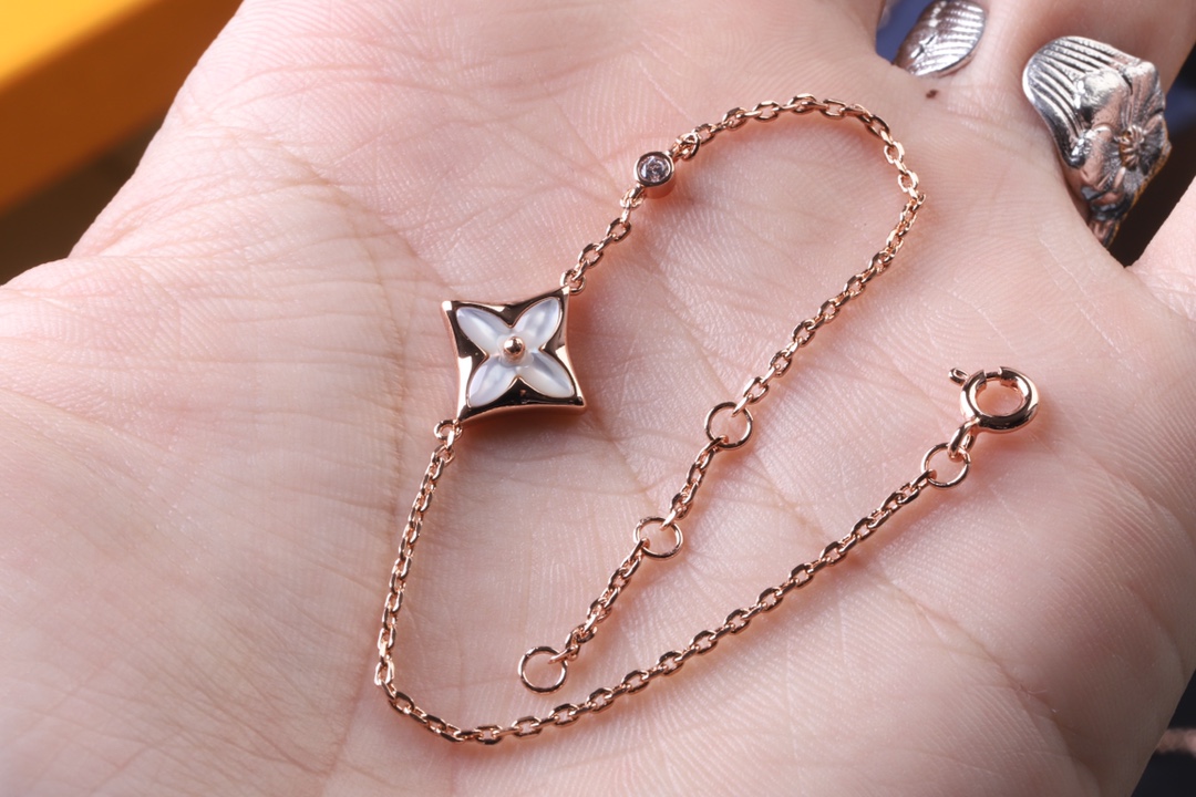 Louis Vuitton Minimalist White Mother of Pearl Star Bracelet - Best Replica Jewelry™