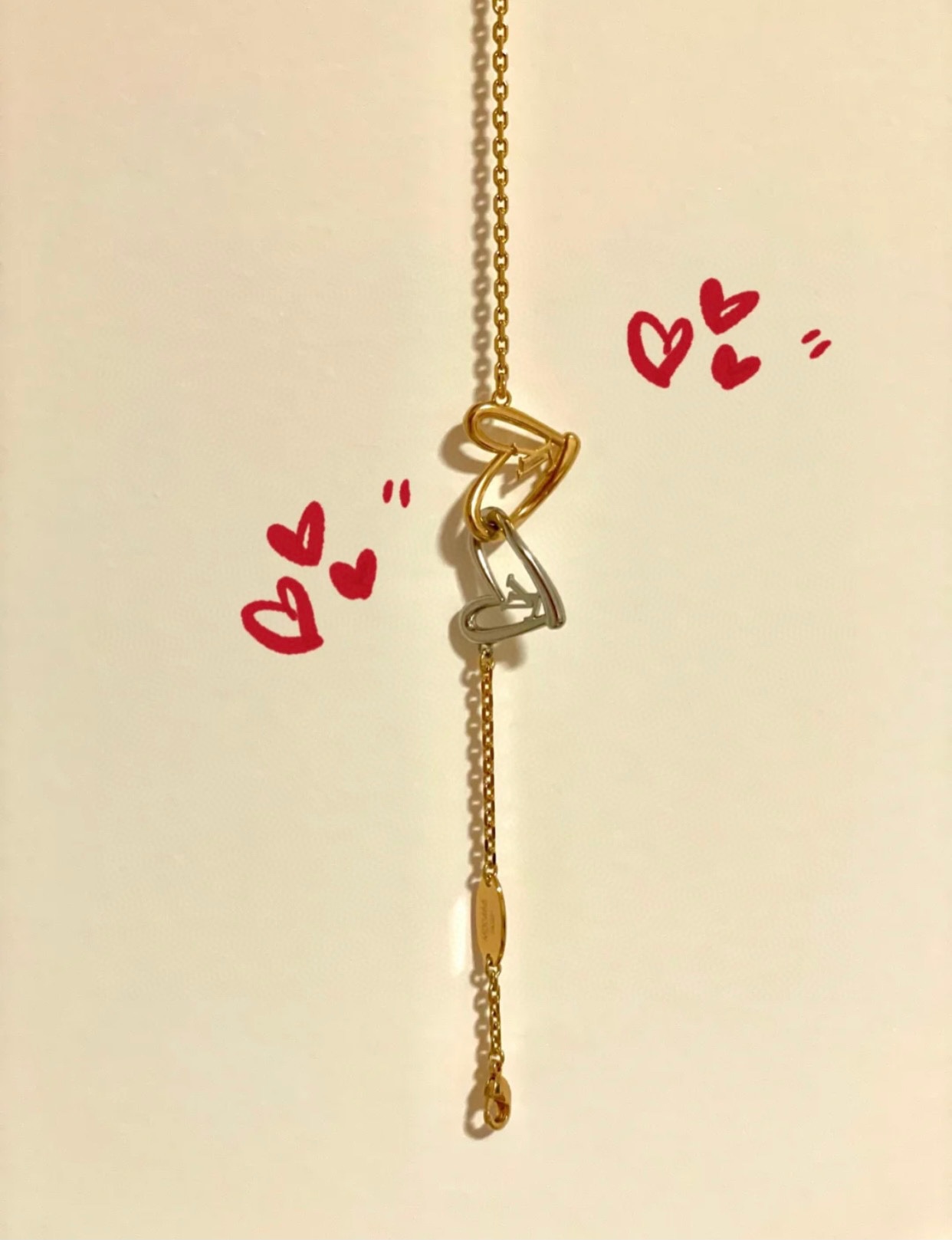 Louis Vuitton Hollow Silver Gold Double Interlocking Hearts Bracelet - Best Replica Jewelry™