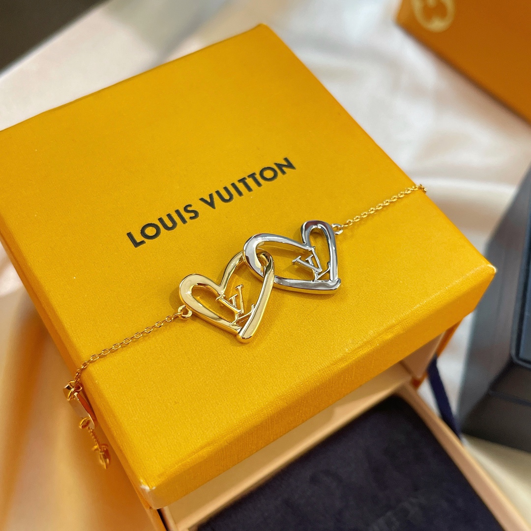 Louis Vuitton Hollow Silver Gold Double Interlocking Hearts Bracelet - Best Replica Jewelry™