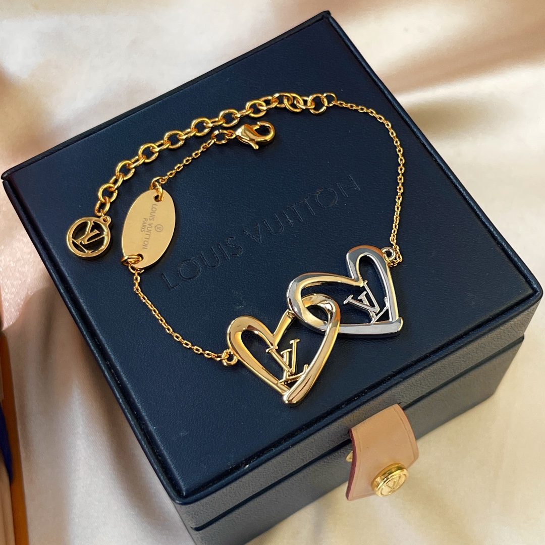 Louis Vuitton Hollow Silver Gold Double Interlocking Hearts Bracelet - Best Replica Jewelry™