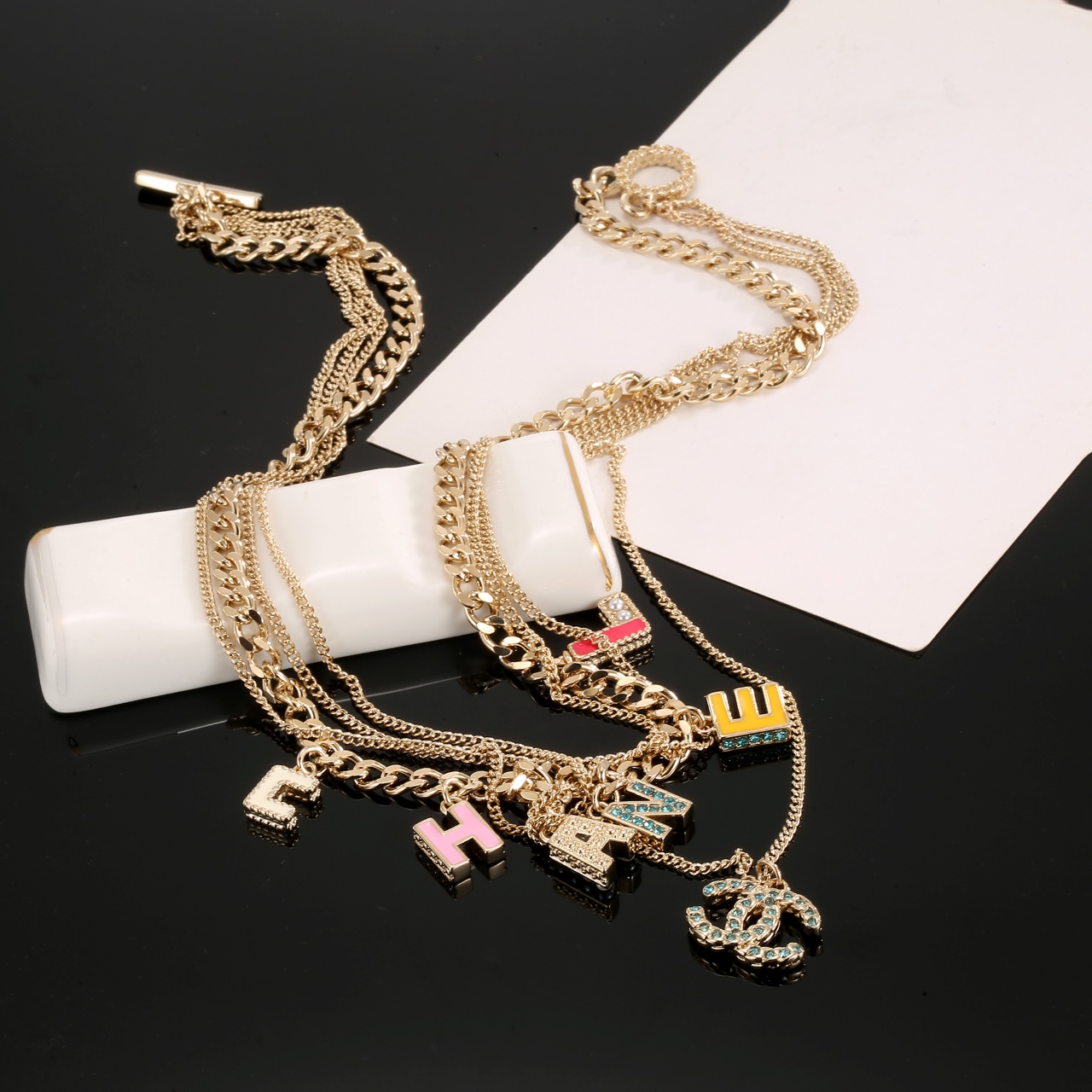 Chanel Multi Layered Light Gold Color Monogram Charms Necklace - Best Replica Jewelry™
