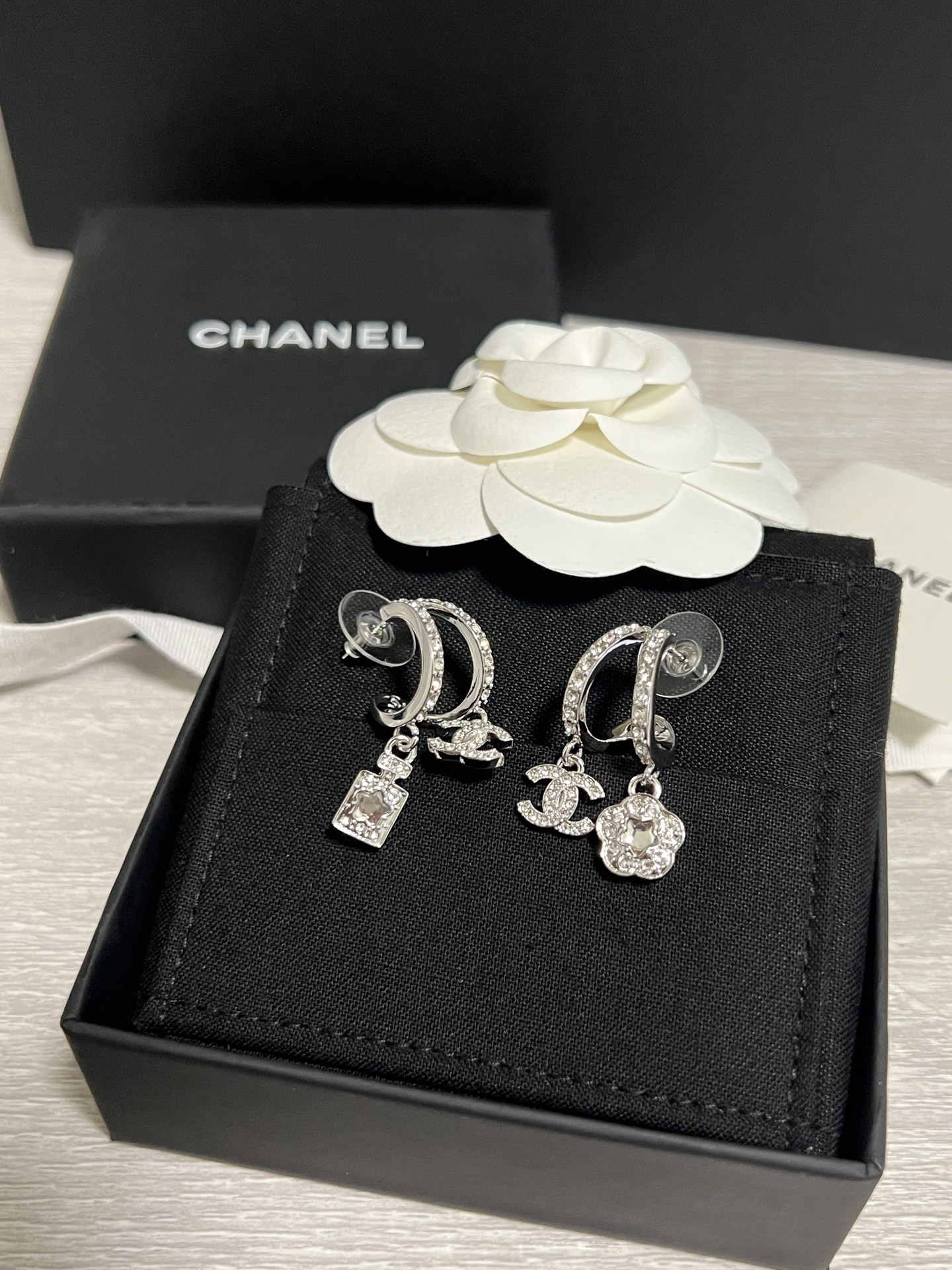 Chanel Asymmetric Silver Earrings with Rhinestone Perfume Bottle Camellia CC Dangle