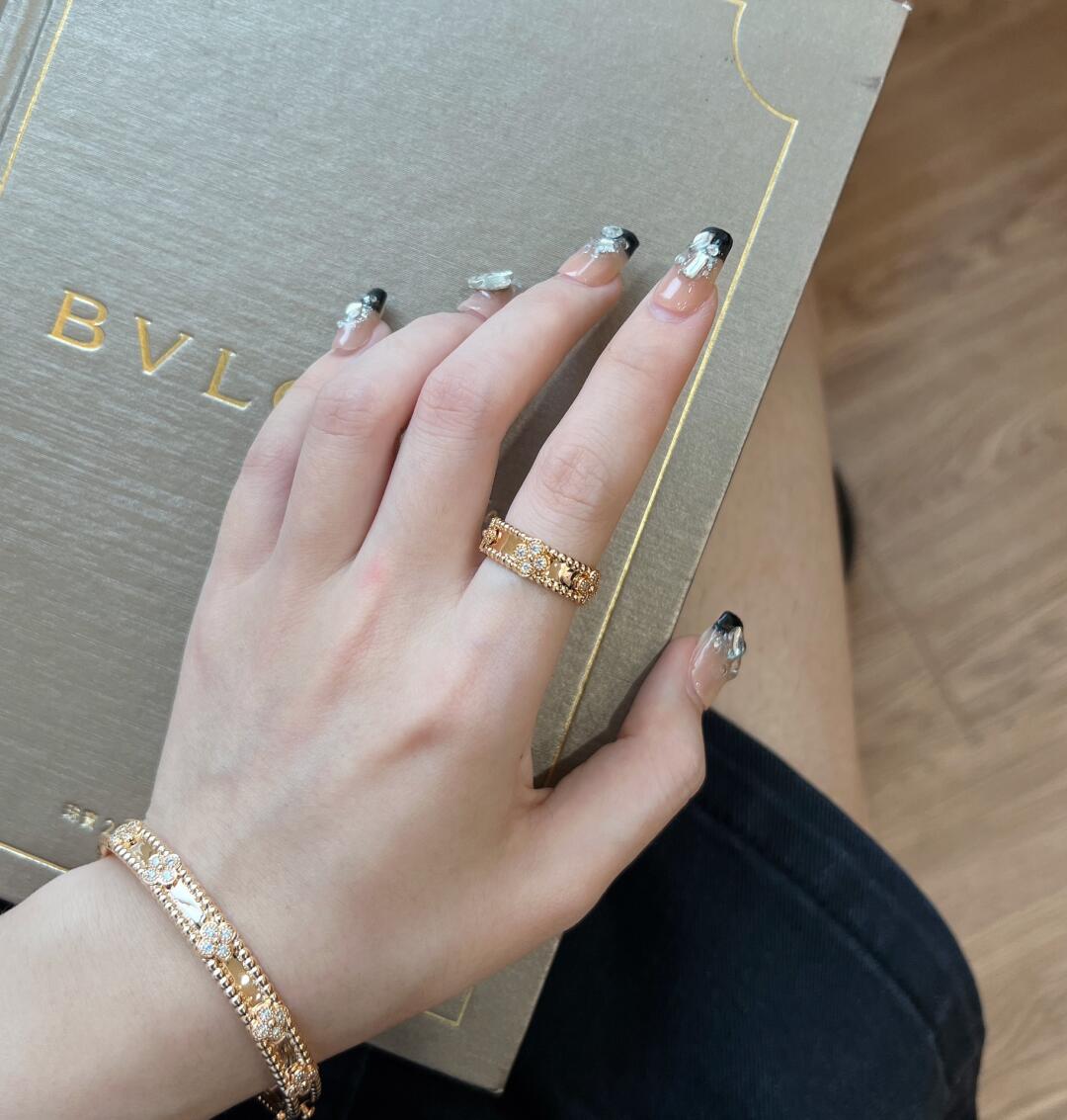 Dupe Van Cleef & Arpels rose gold Perlee Sweet Clovers Bracelet and ring on hand wrist