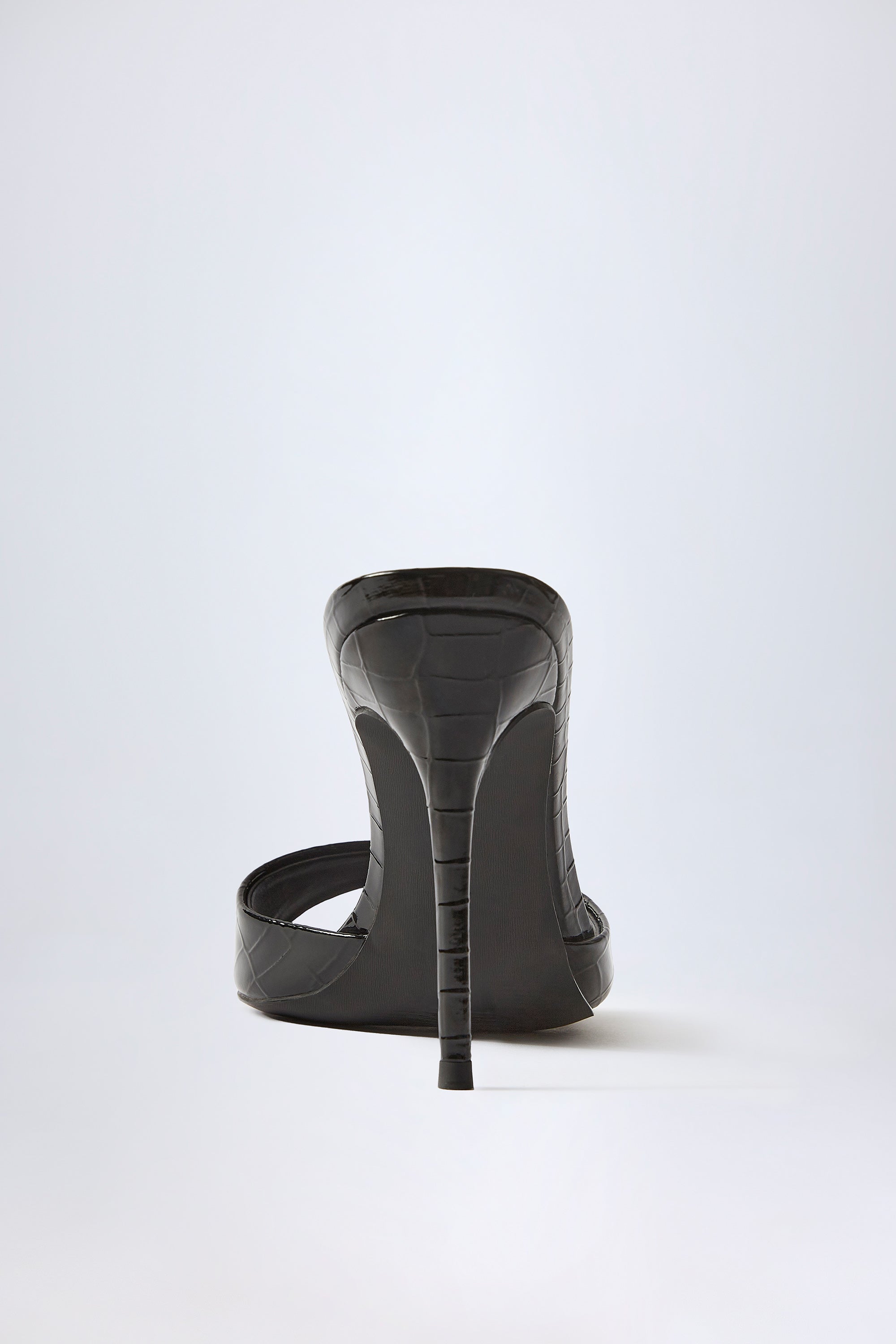 Amandine-Almond-Toe Heeled Mules in Croc Patent Black