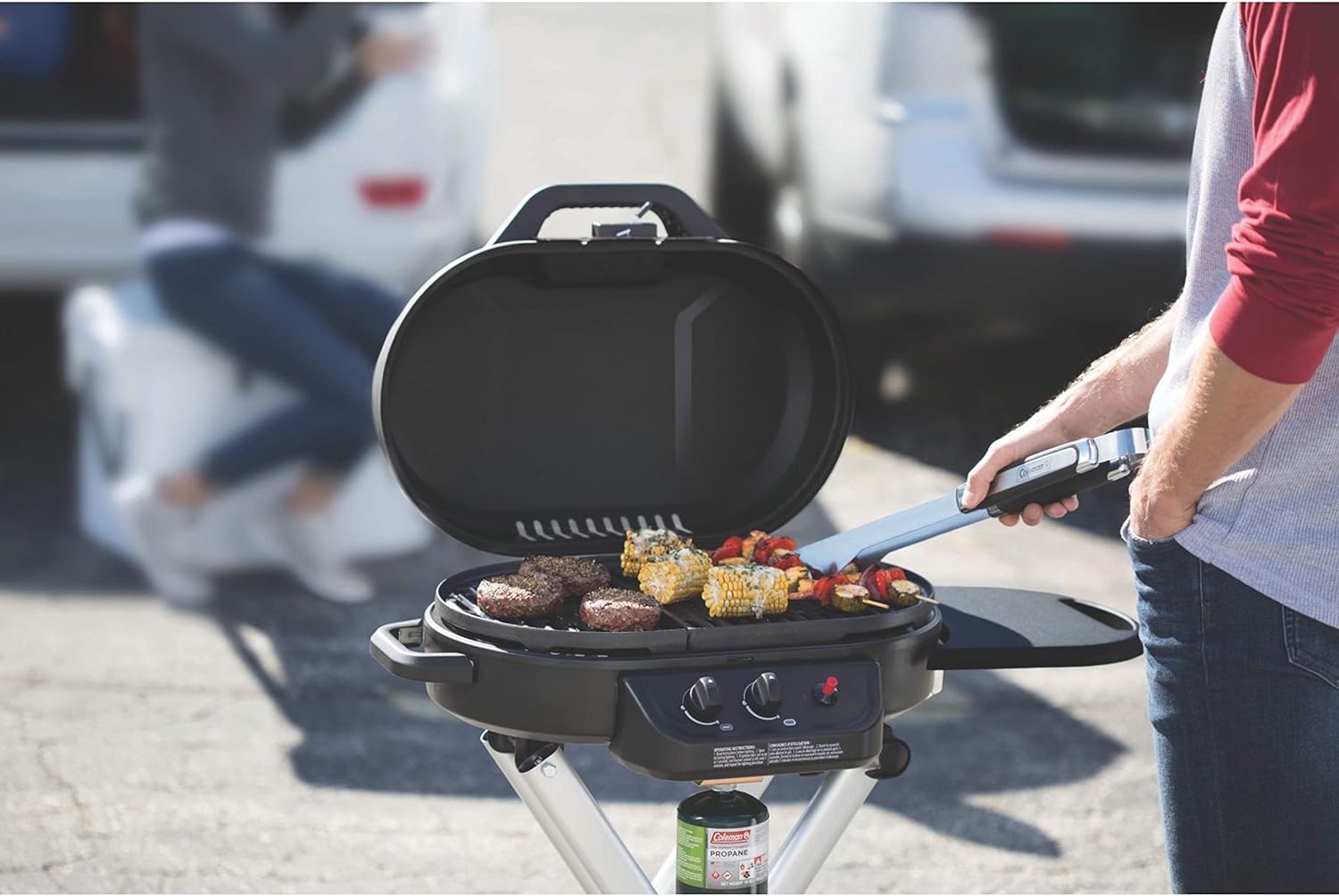 RoadTrip 225 Portable Stand-Up Propane Grill, Gas Grill with Push-Button Starter, Folding Legs & Wheels, Side Table, & 11,000 BTUs of Power for Camping, Tailgating, Grilling & More