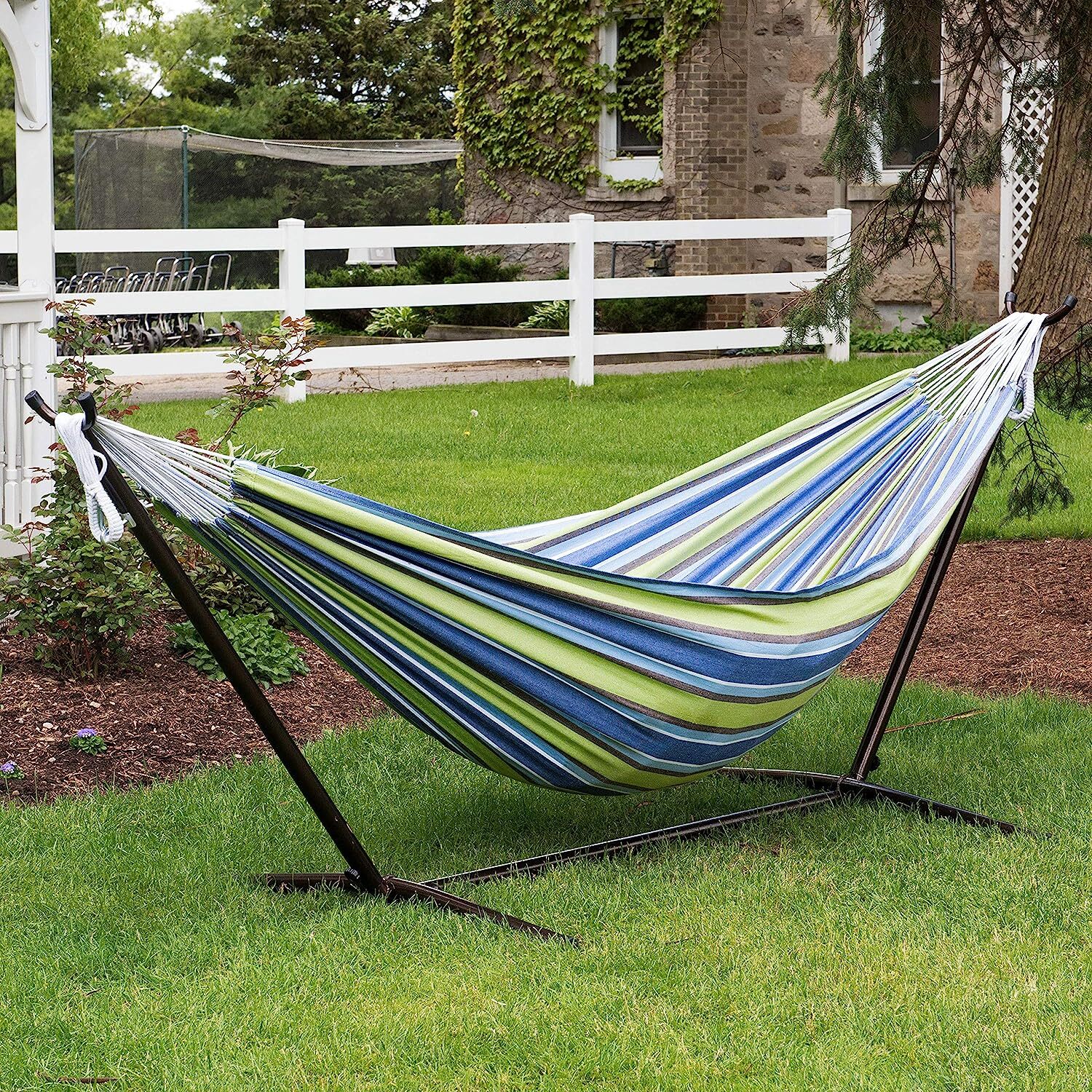 Vivere Double Cotton Hammock with Steel Stand, 450 lb Capacity, Tropical Colors, Includes Premium Carry Bag