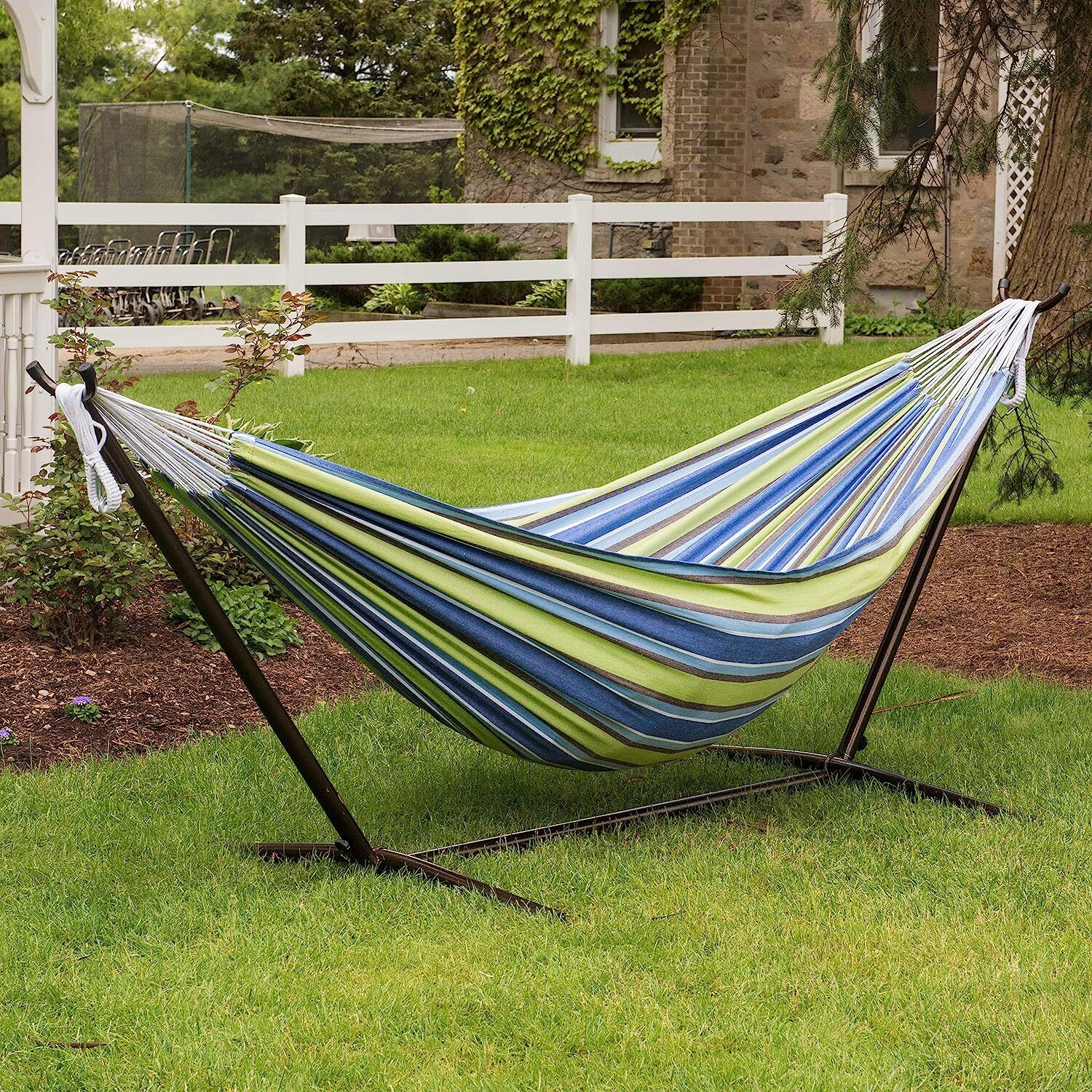 Vivere Double Cotton Hammock with Steel Stand, 450 lb Capacity, Tropical Colors, Includes Premium Carry Bag