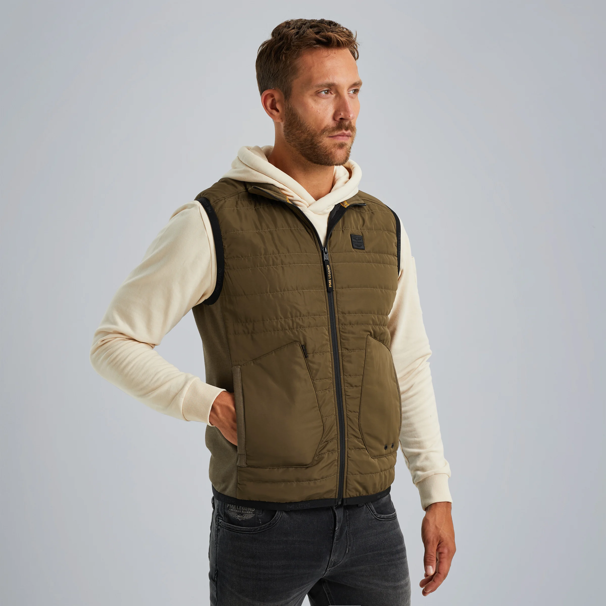 Bodywarmer in a material mix Green