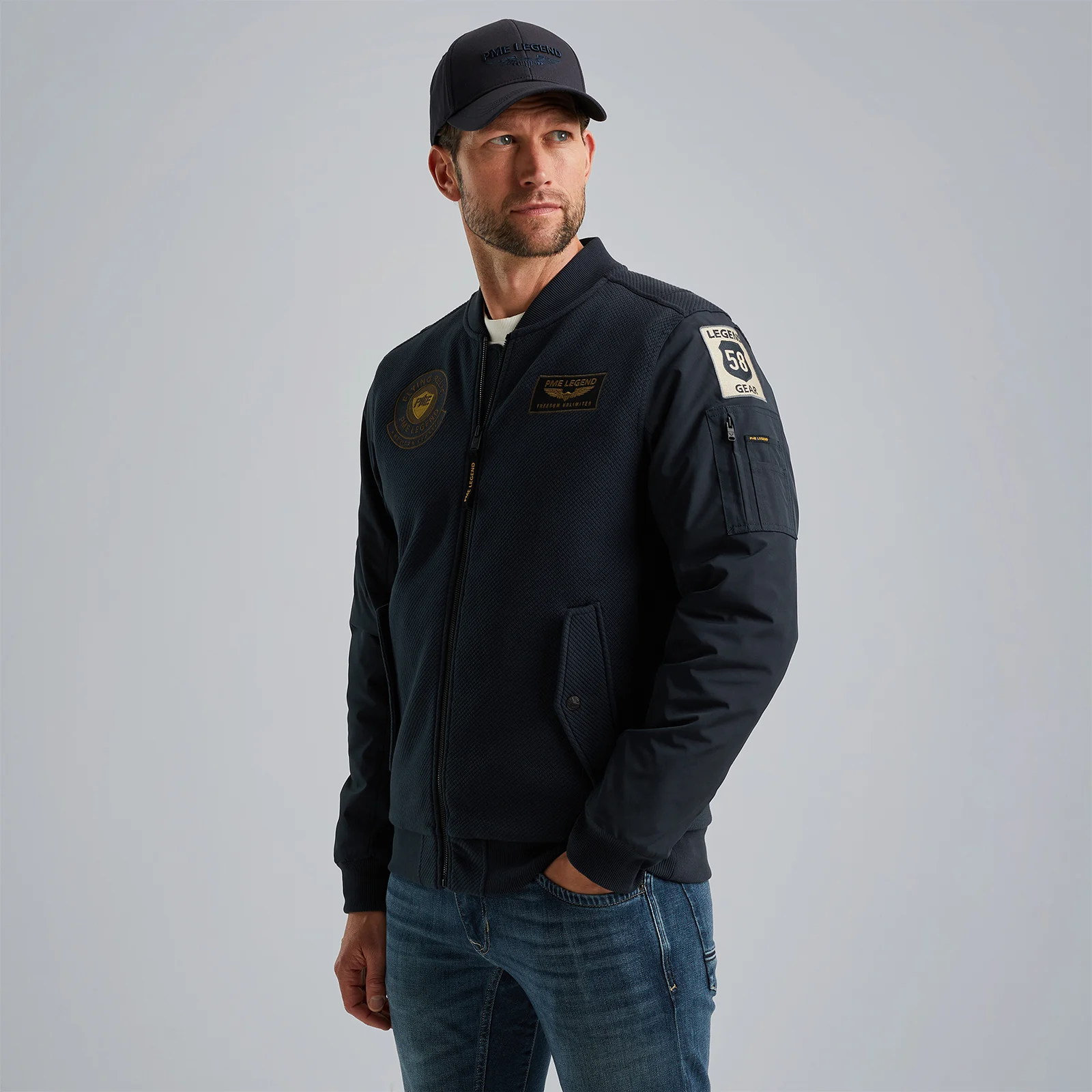 Sweat jacket with badges Blue