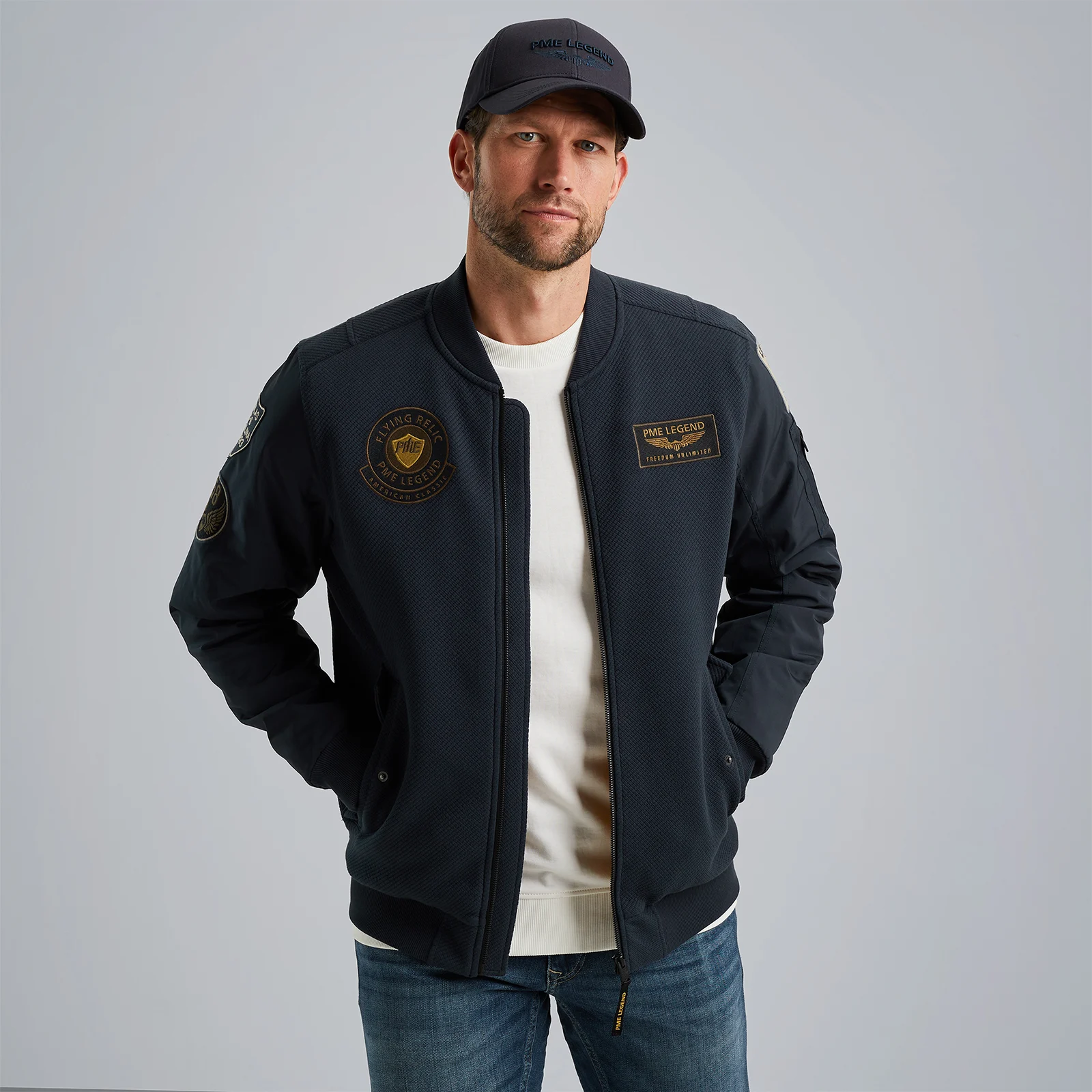 Sweat jacket with badges Blue