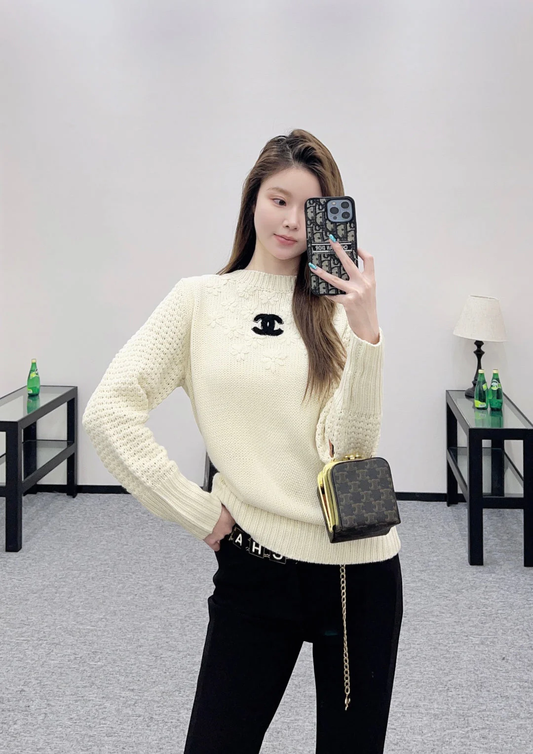 Knitted sweater with hook and loop design