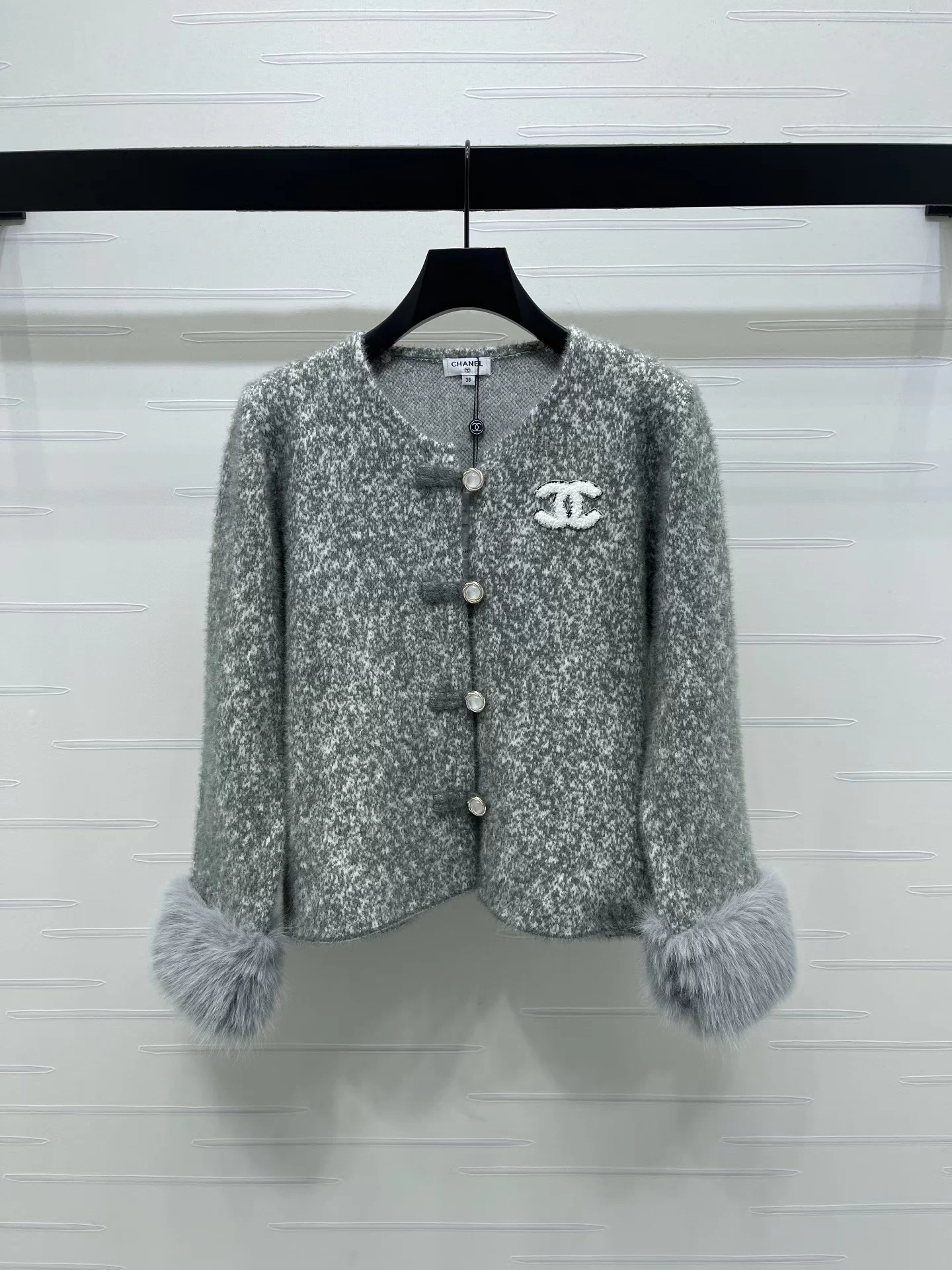 Detachable woolen sleeve round neck cardigan