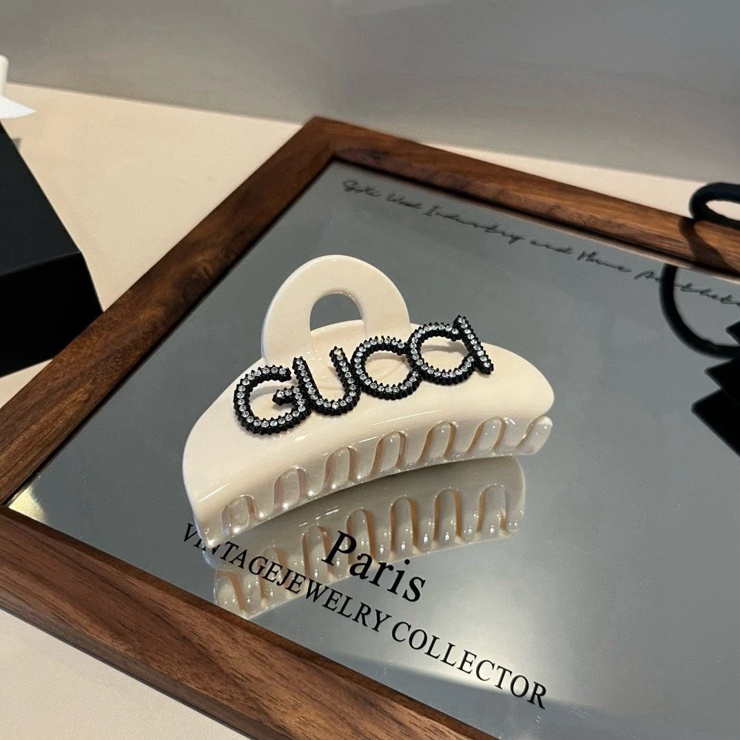 Diamond logo hair clip