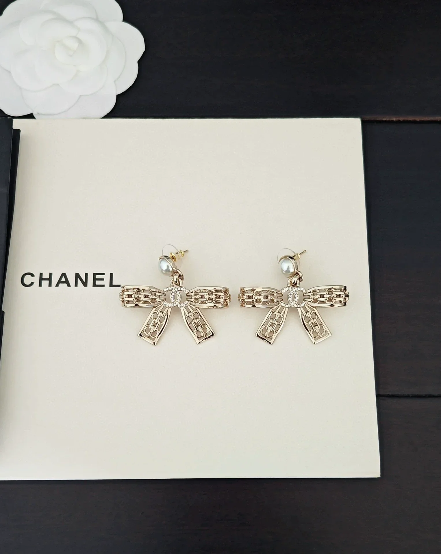 Light gold hollow bow earrings