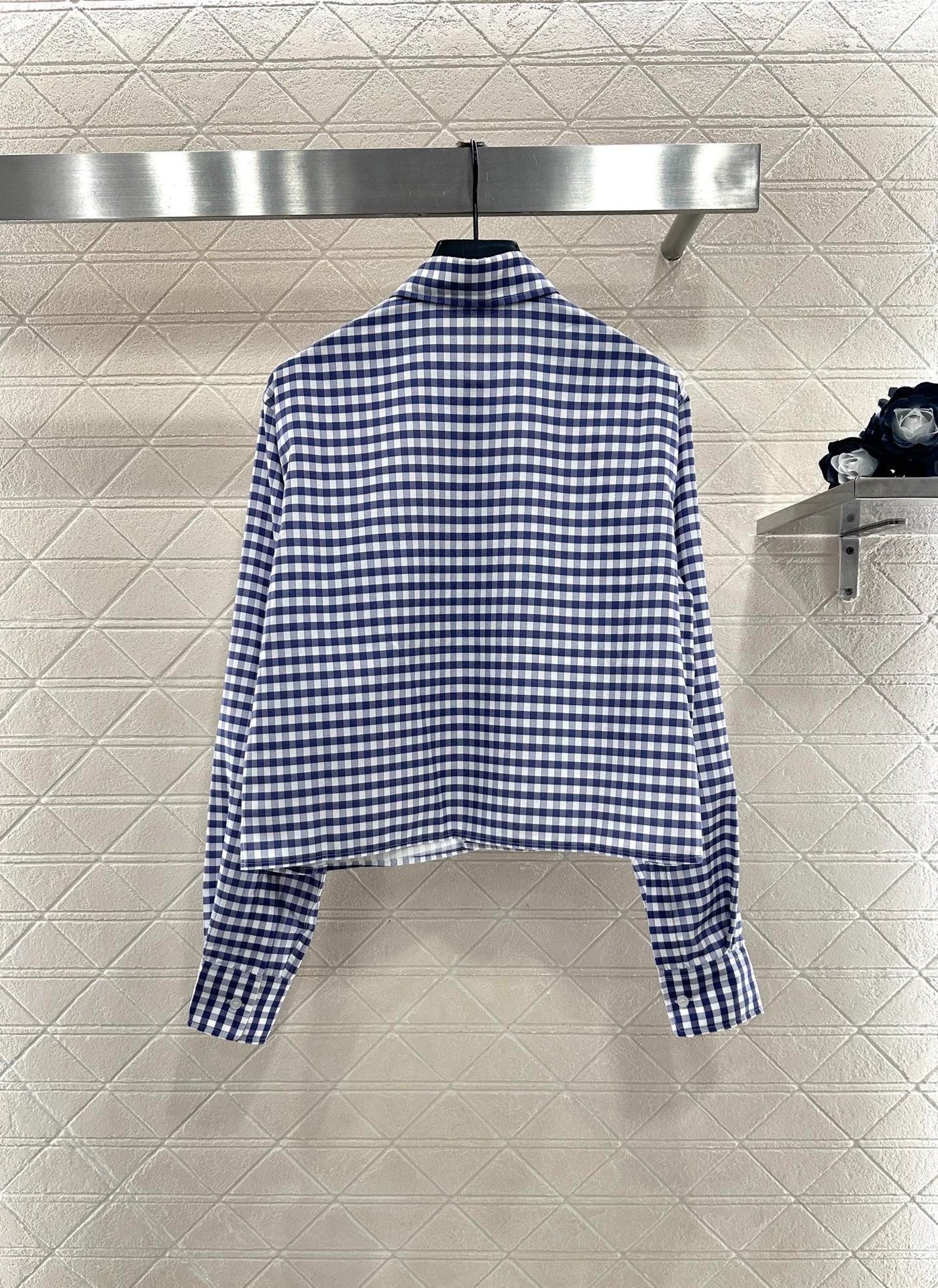 Short blue and white checkered shirt