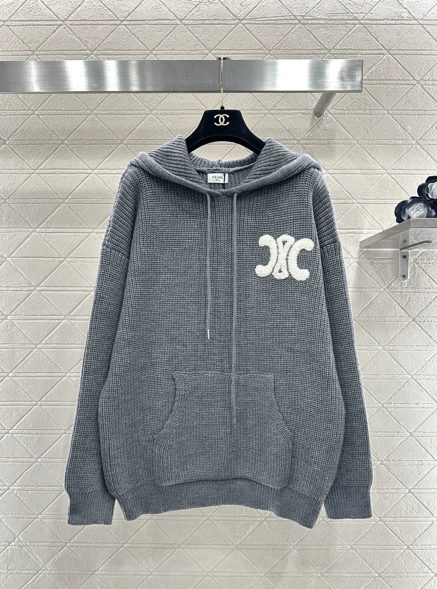 Knitted hooded top
