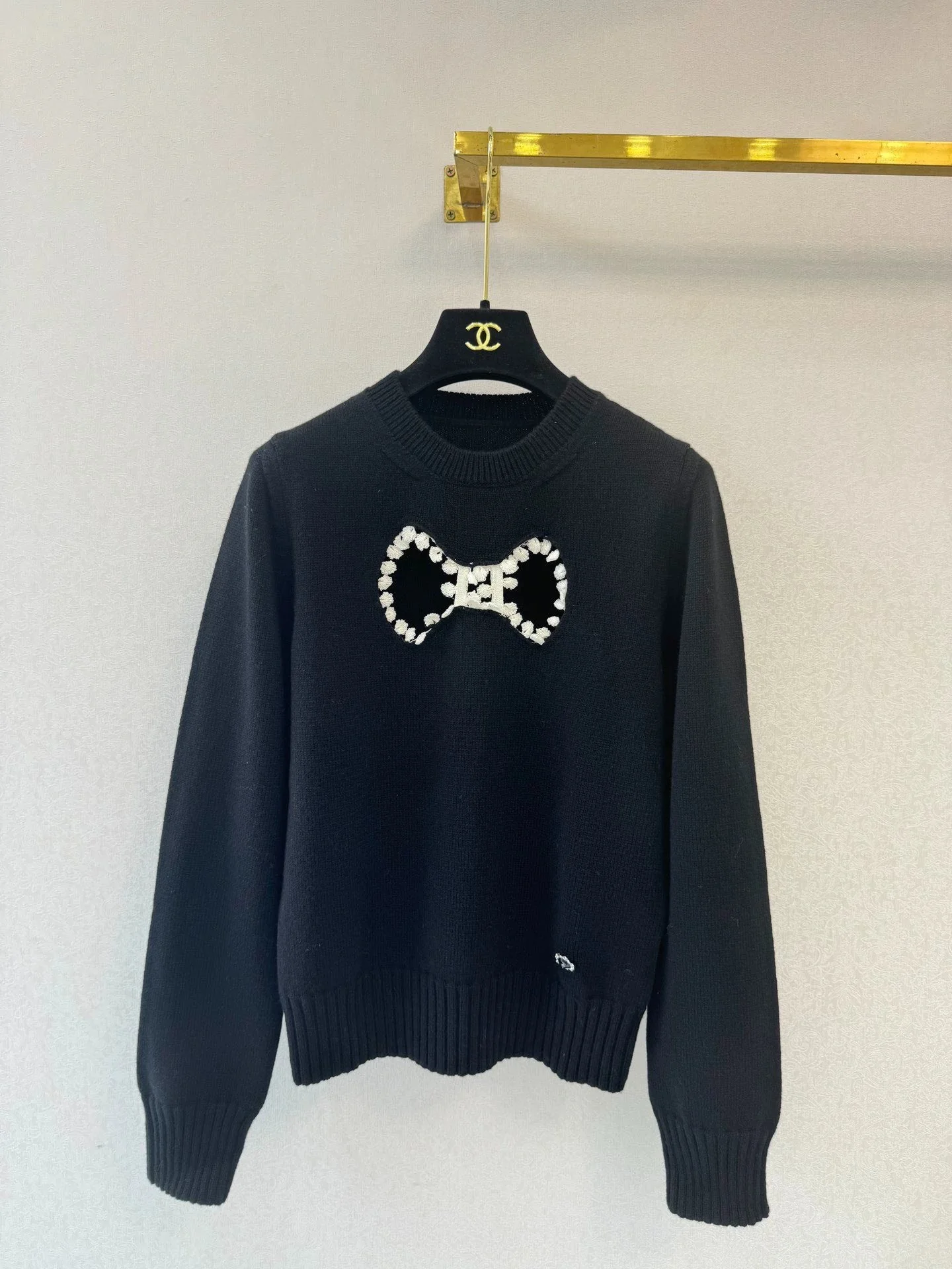 Bow hollow knitted sweater