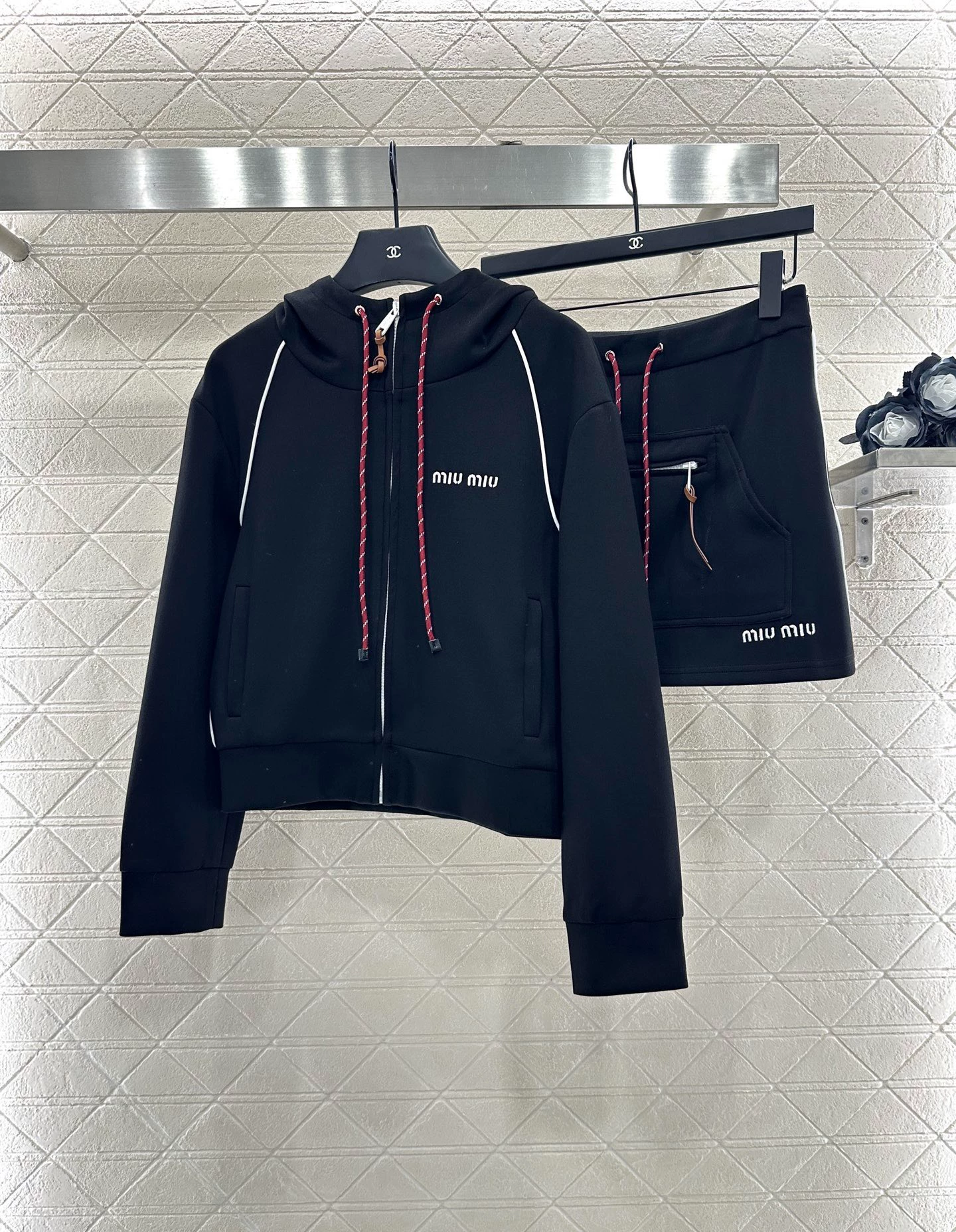 25 Hooded jacket and short skirt set