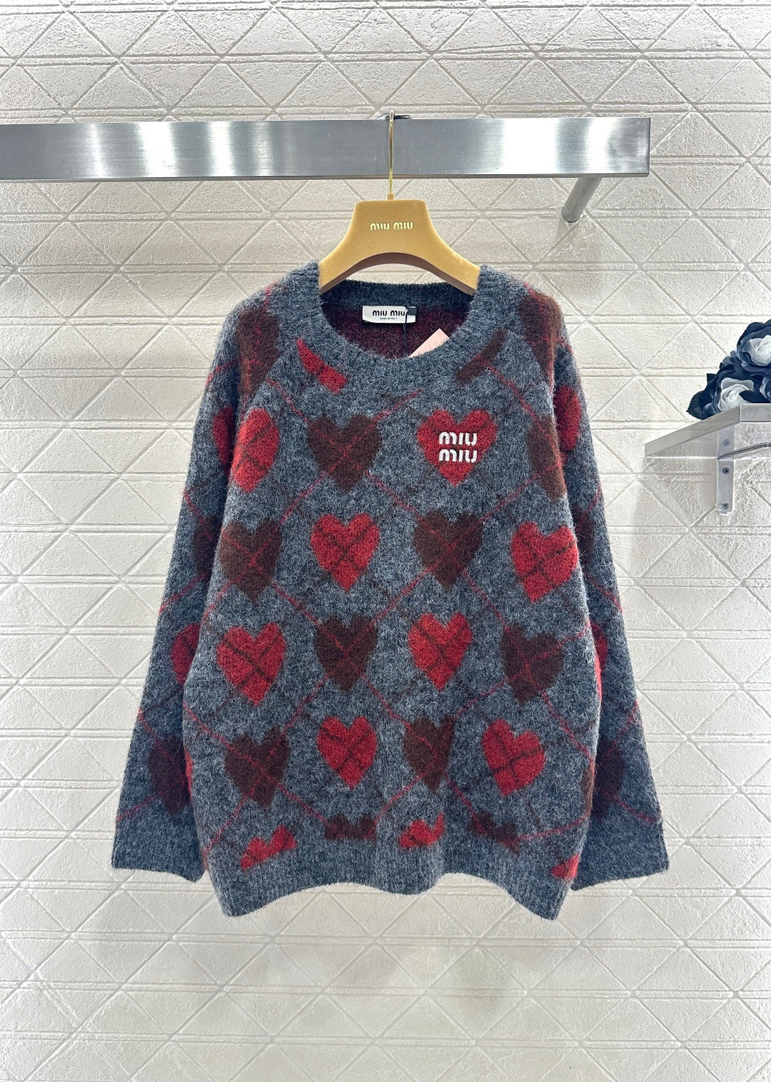 Heart-patterned plaid sweater