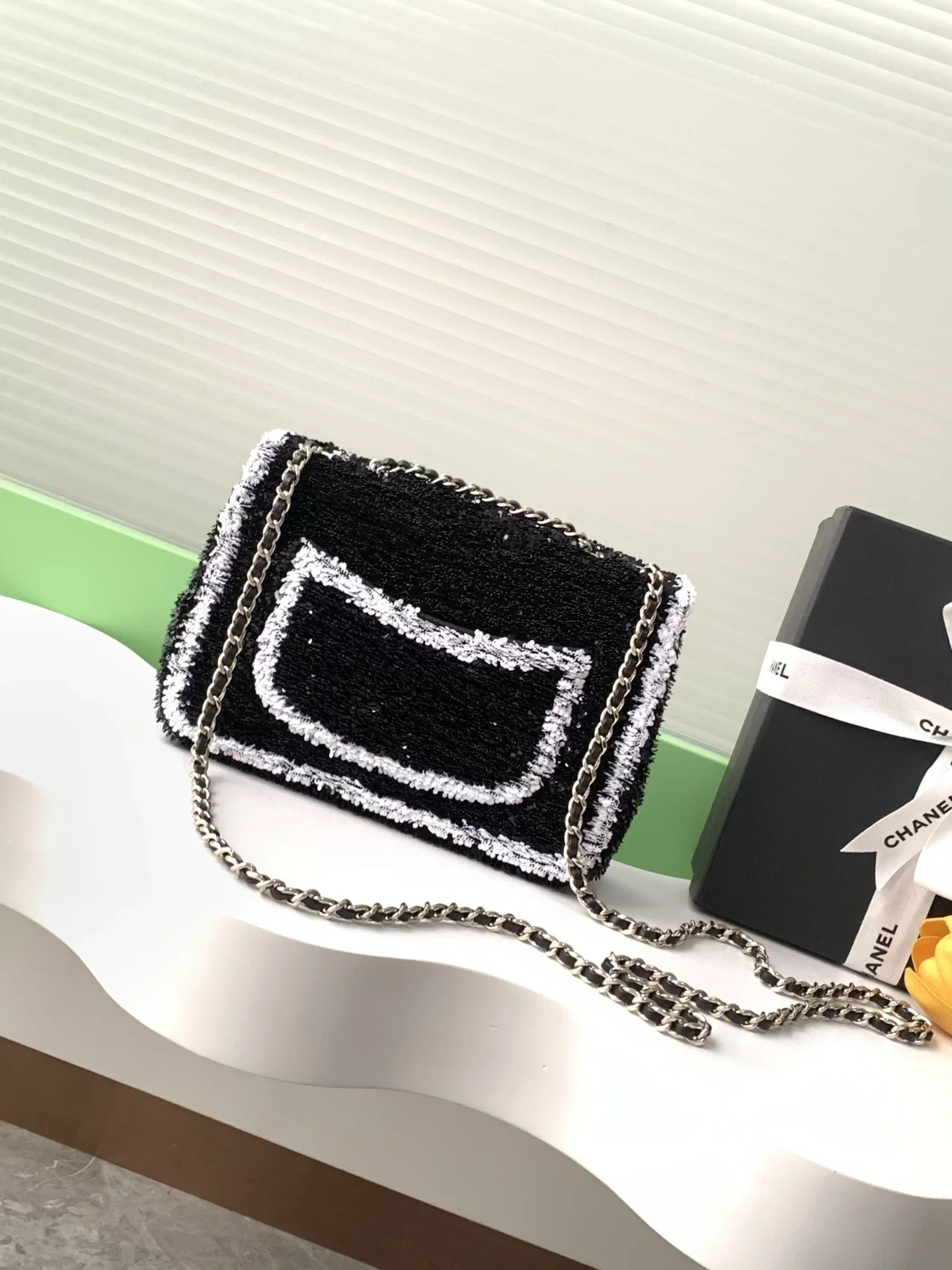 Black and white sequined bag