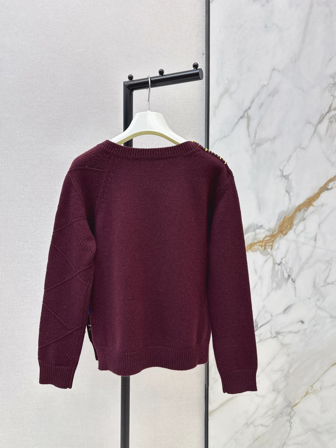 Asymmetrical crew neck sweater