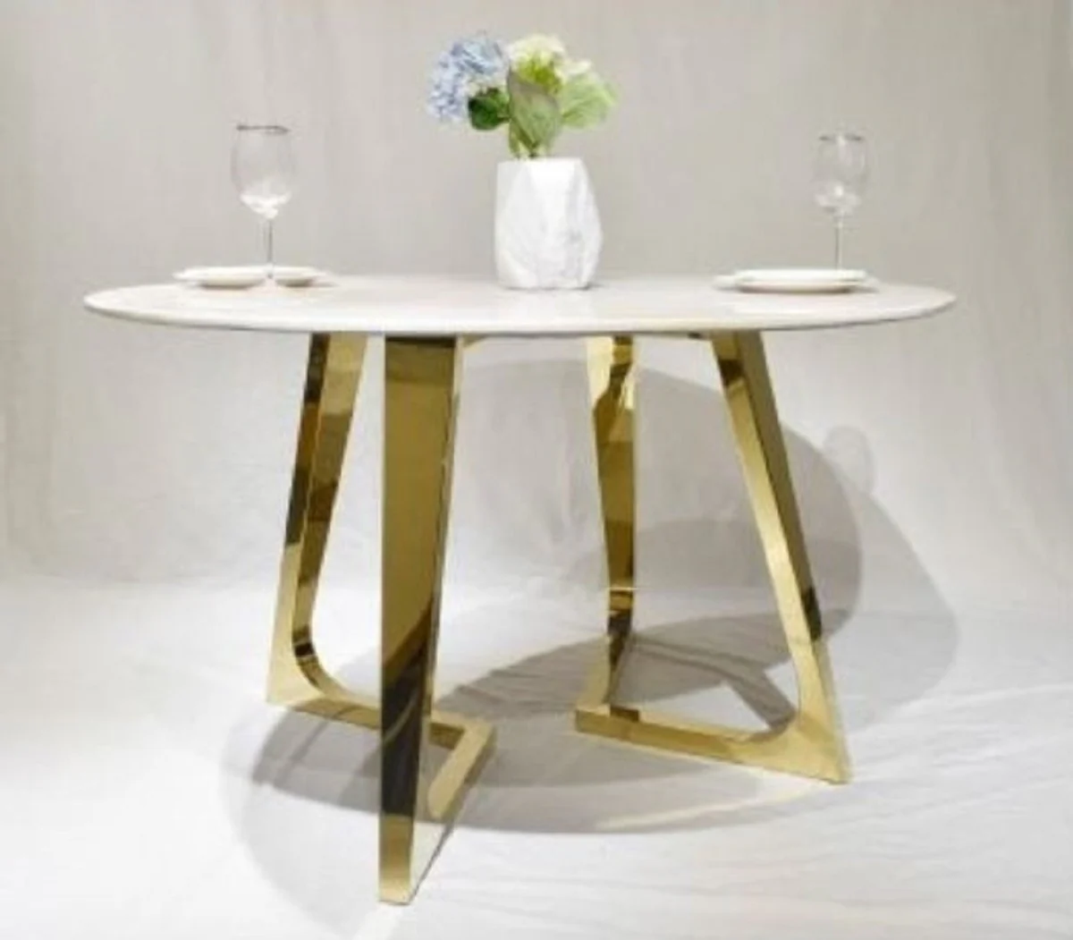 Luxury dining table white / gold Ø 130 x H. 76 cm - Round dining room table with synthetic marble top and steel legs - Dining room furniture