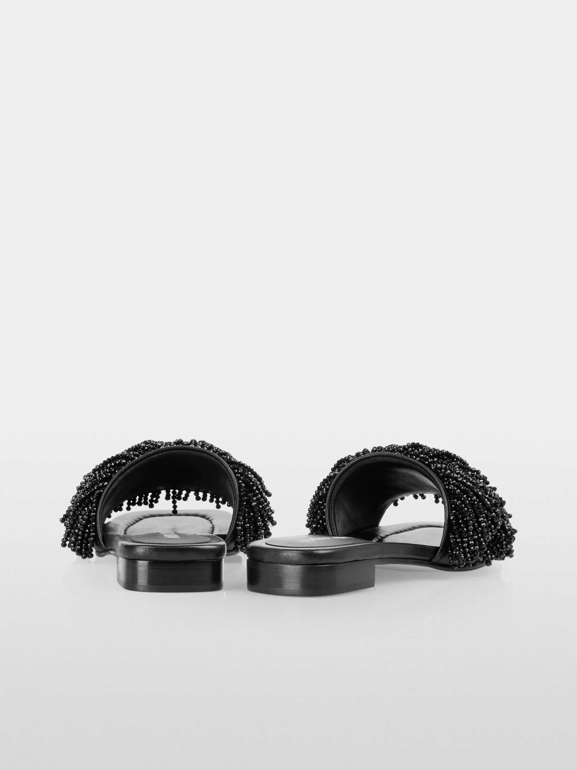 Marc-Cain Flache Pantoletten mit Perlenriemen