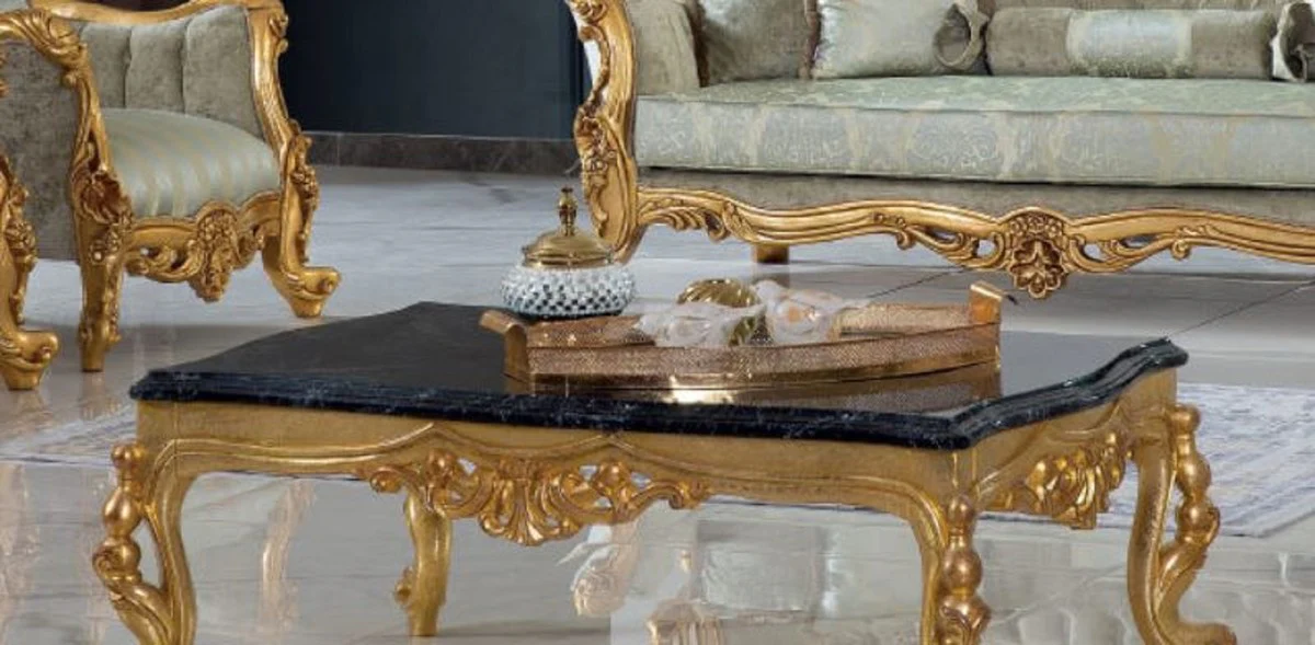 Luxury baroque coffee table black / gold 120 x 85 x H. 50 cm - magnificent solid wood living room table with table top in marble look - baroque furniture