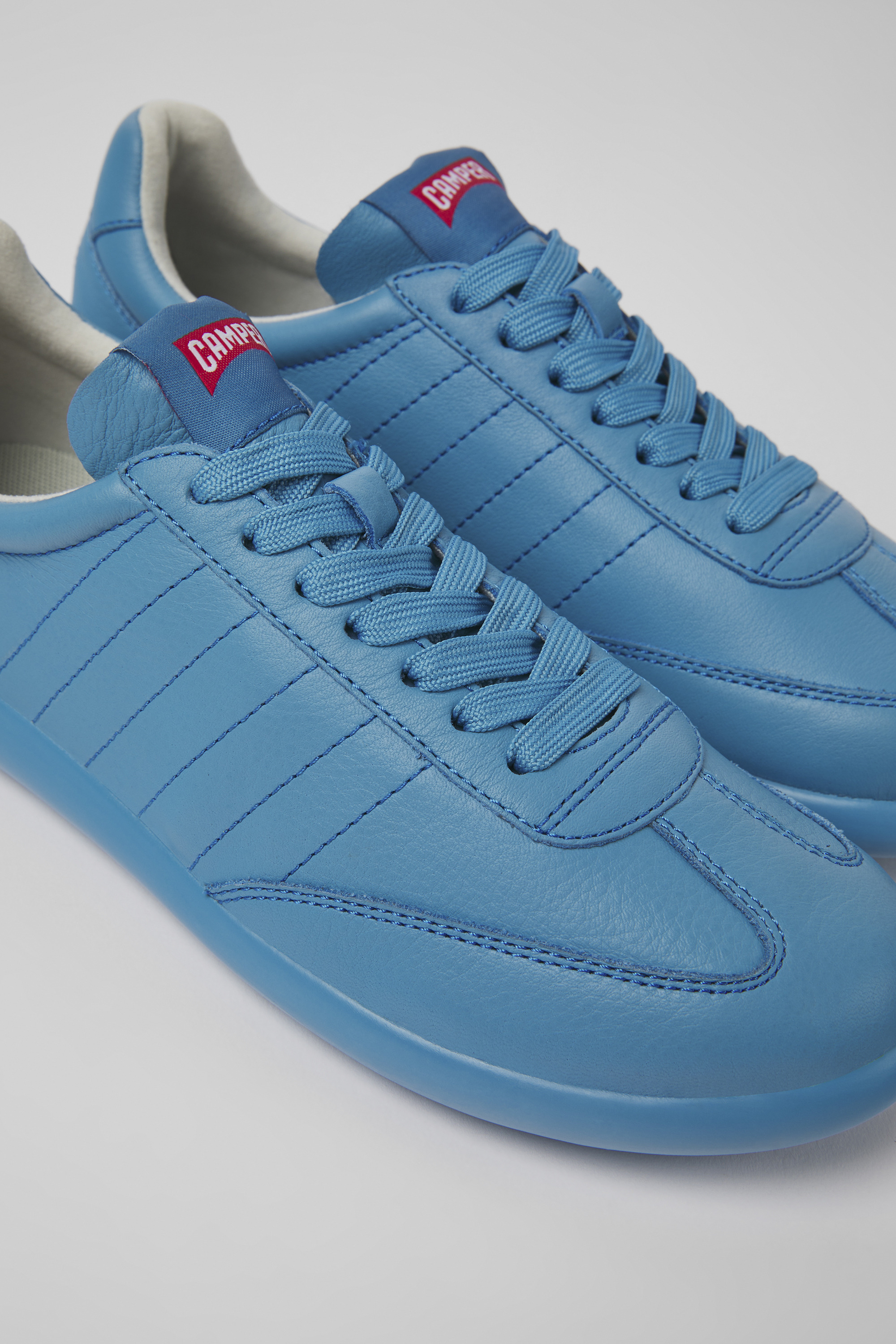 Pelotas XLite - Blaue Leder Turnschuhe für Damen