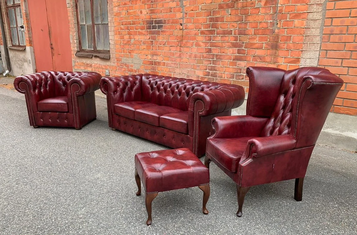 Luxury Chesterfield leather wing chair with stool burgundy red