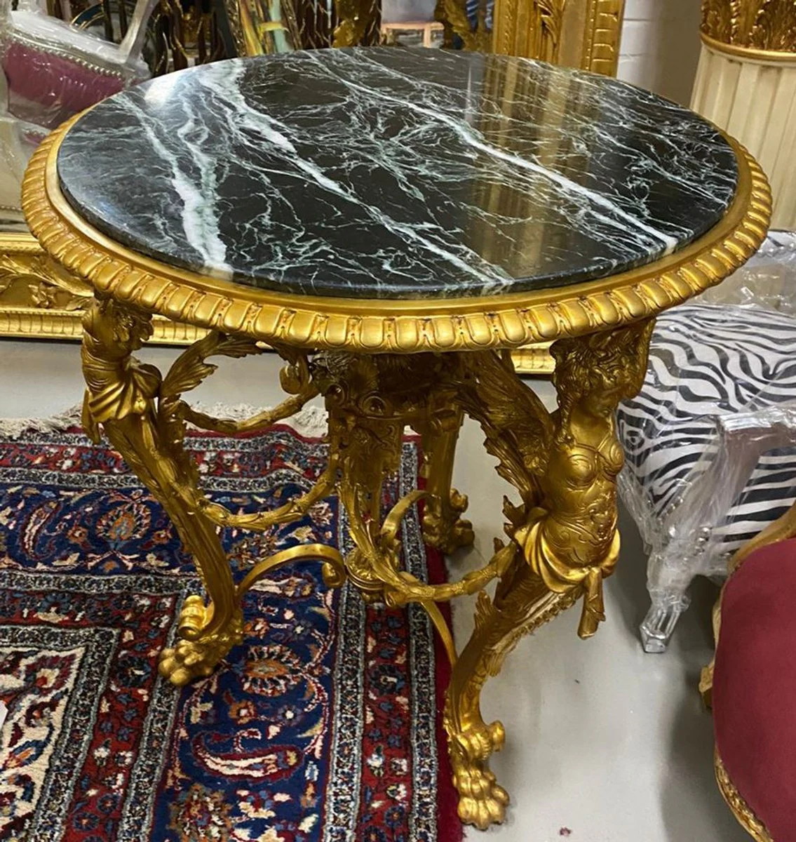 Luxury baroque side table gold / black - magnificent round bronze table with marble top - luxury furniture in baroque style - baroque style living room furniture - baroque furniture - noble & magnificent