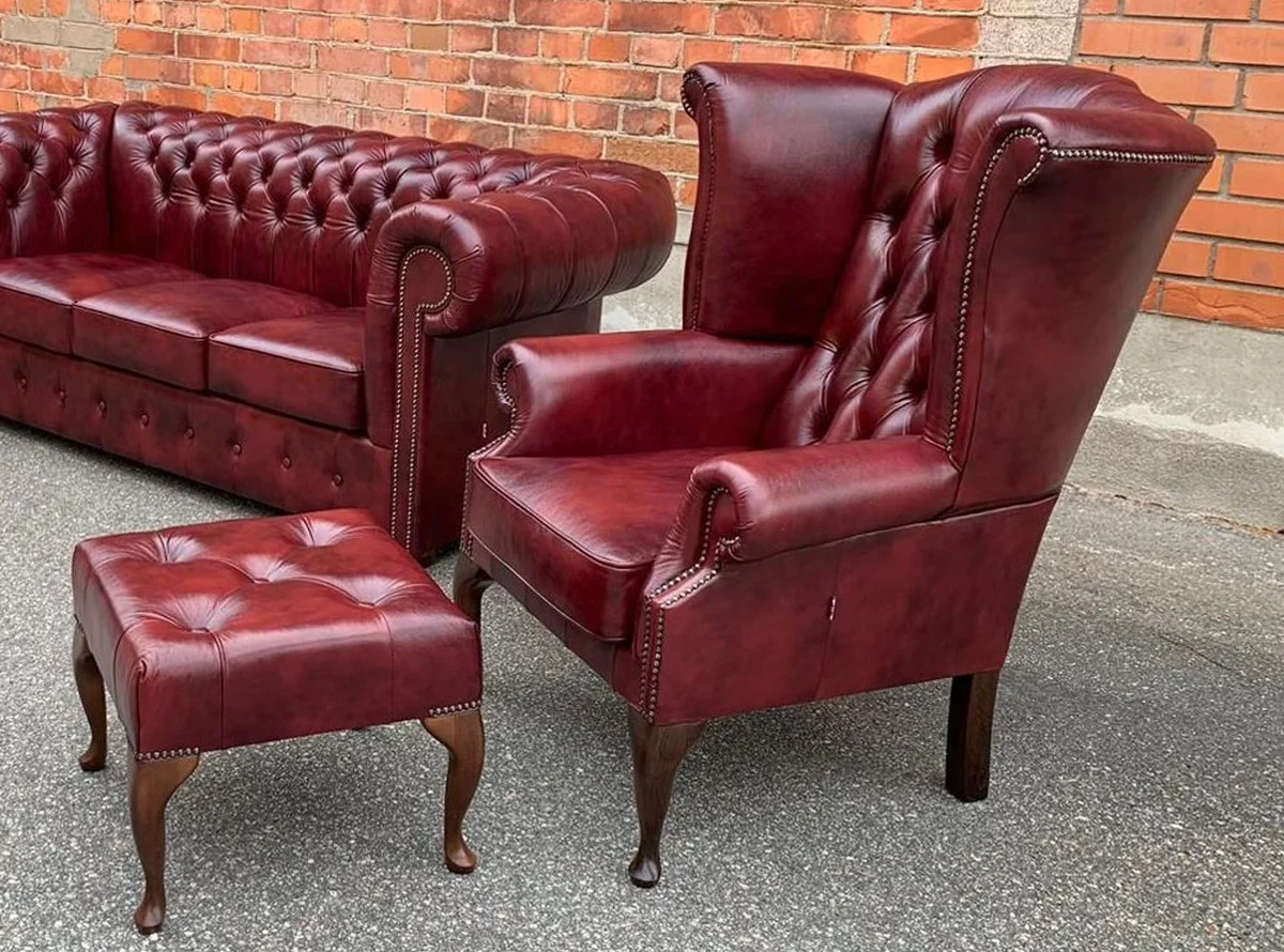 Luxury Chesterfield leather wing chair with stool burgundy red