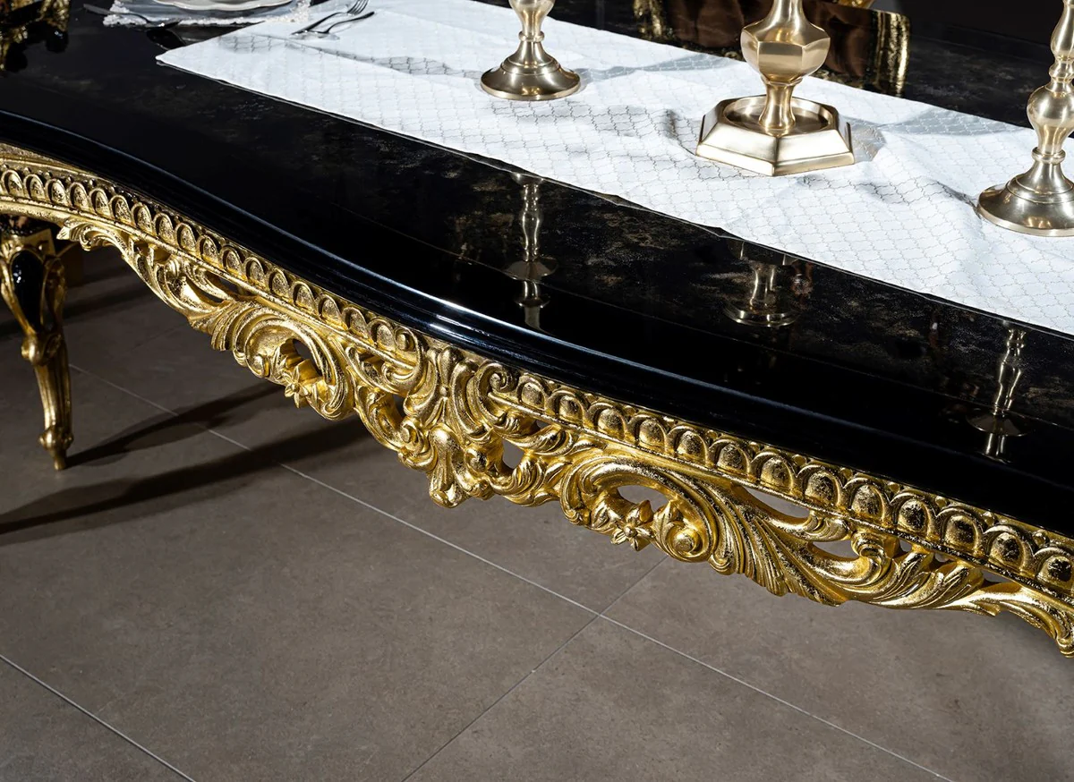 Luxury baroque dining table black / gold 230 x 114 x H. 80 cm - magnificent solid wood dining room table - dining room furniture in the baroque style