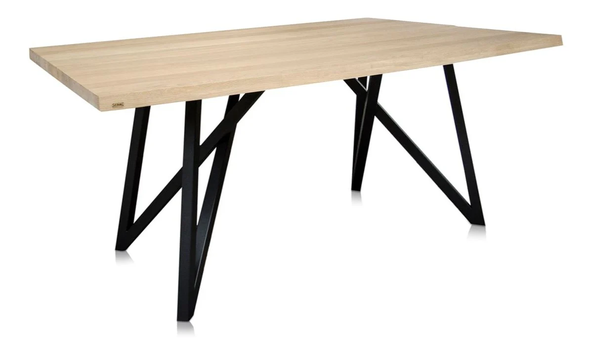Luxury dining table with natural colored table top and black legs - dining room furniture