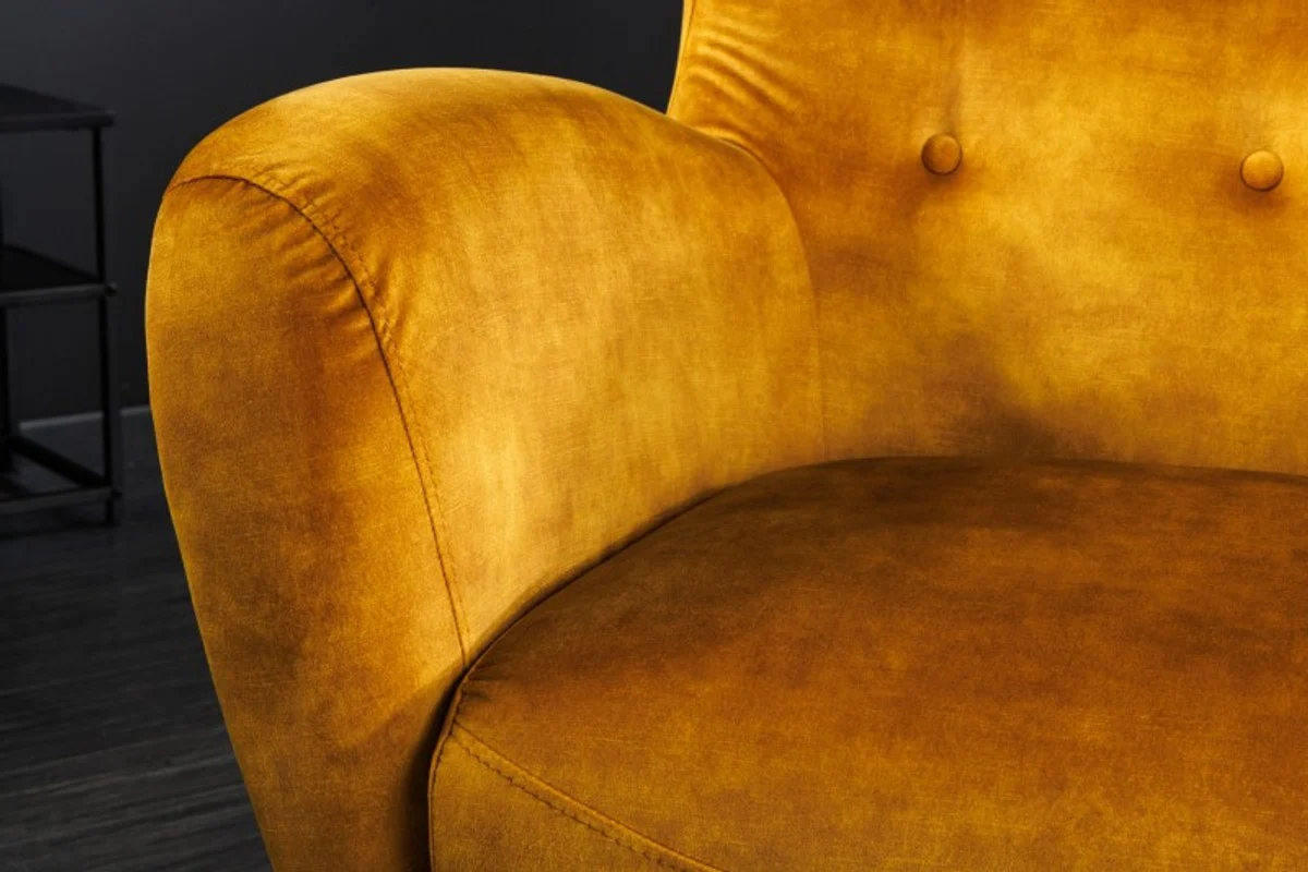 Chesterfield armchair mustard yellow / black / silver wing chair from Casa Padrino