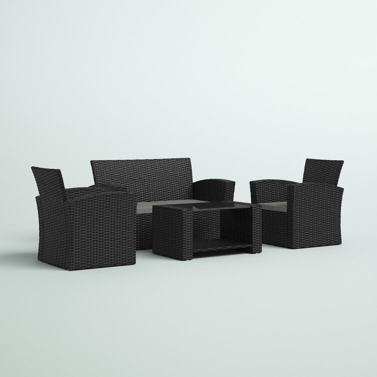 Charmain 4 Piece Rattan Sofa Sitzgruppe mit Kissen